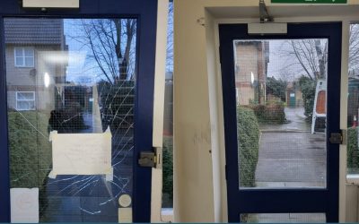 Replace reinforced glass in an emergency exit door at a school in Enfield
